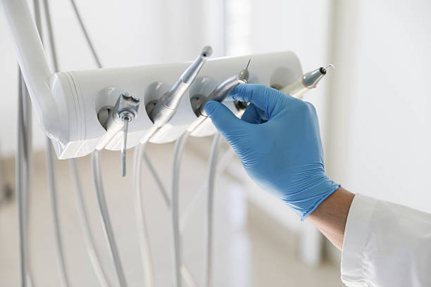 Professional Root Canal Treatment technician working in Cochituate, MA